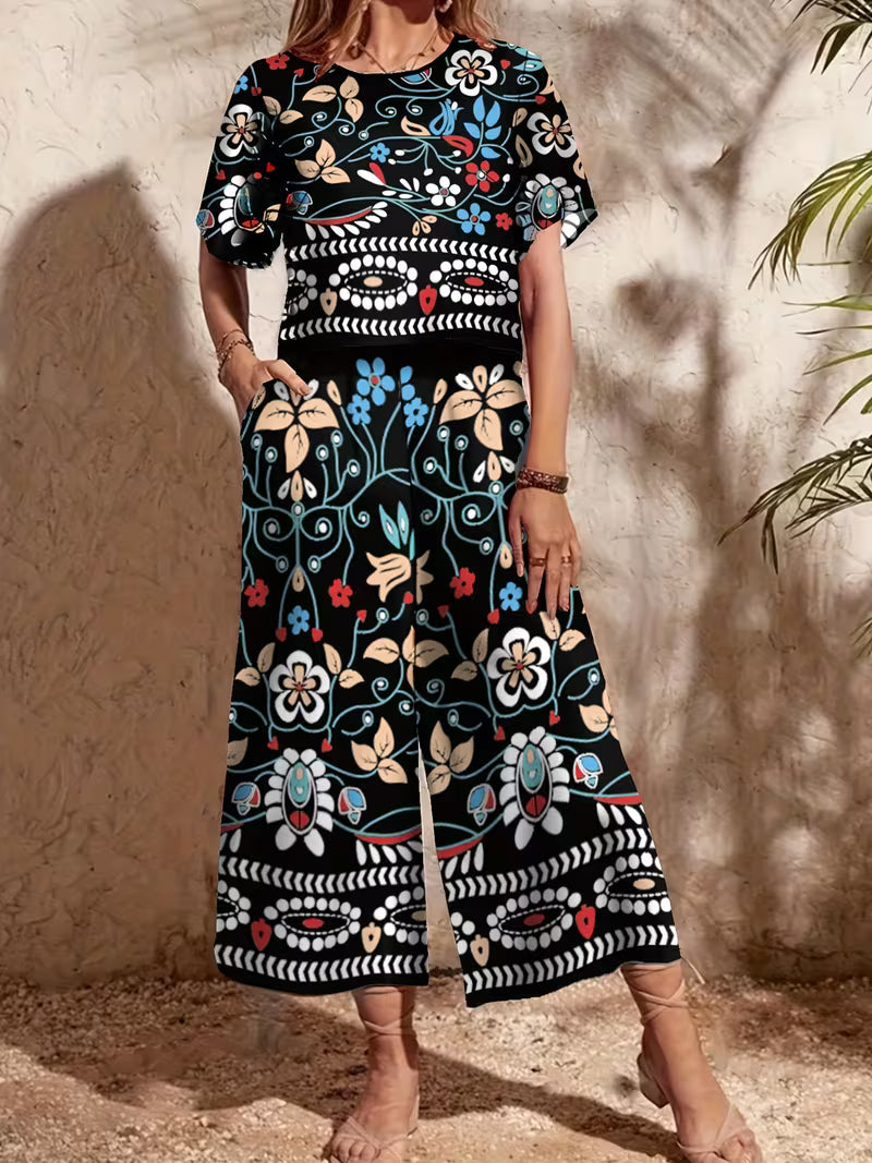 versatile vacation outfit with floral print, round-neck short top and comfortable loose wide-leg pants featuring elastic waistband