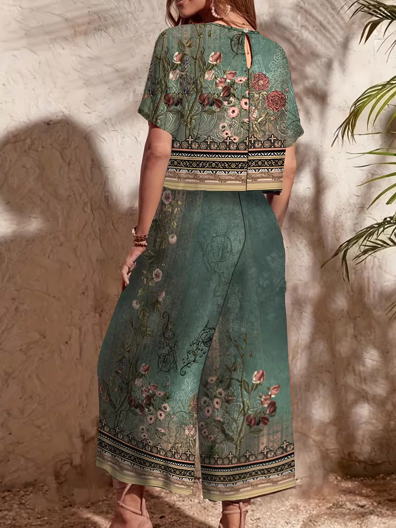 ersatile vacation outfit with floral print, round-neck short top and comfortable loose wide-leg pants featuring elastic waistband